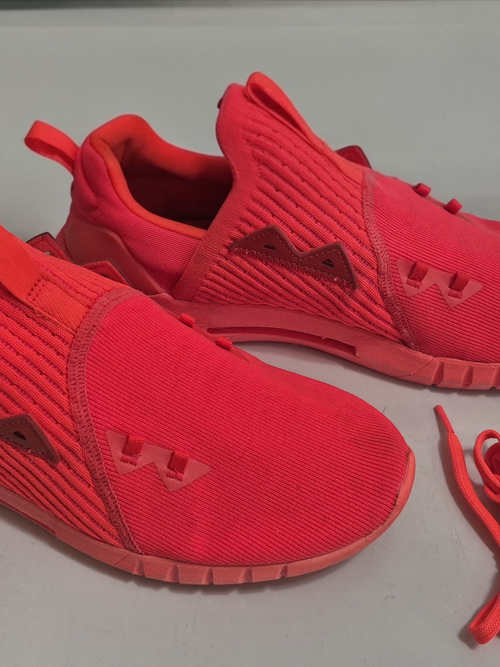 Under Armour Slip-On Sneakers in Bright Red